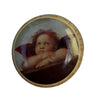 A round vintage pin featuring a miniature reproduction of Leonardo da Vinci's Mona Lisa, set in a gold-toned metal frame and resting on a white circular surface.