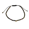 Green and pink tourmaline bracelet with 9k gold accents, a pavé pyramid centrepiece and adjustable black macramé closure